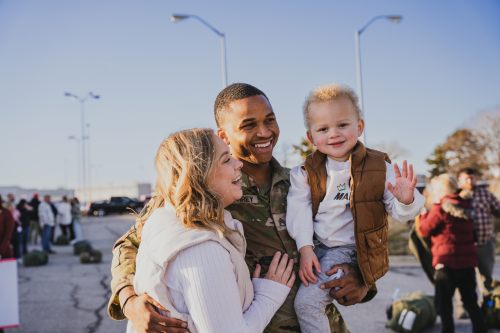 Family smiles together.